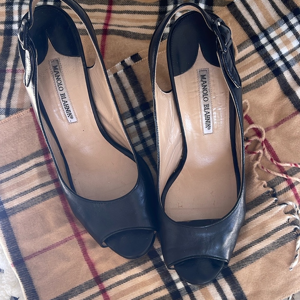 Manolo Blahnik leather black, sling back, peep toe Stilletto heels.Size 10 1/2.